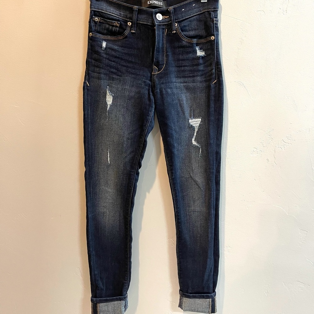 Express women’s mid rise slightly distressed skinny jean